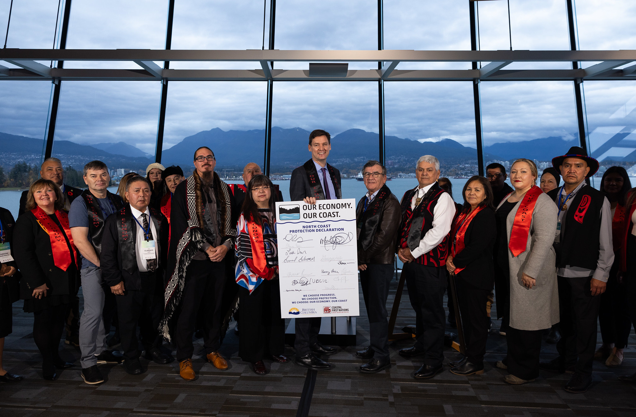 BC Premier David Eby stands alongside Coastal First Nations leaders at the signing the North Coast Protection Declaration
